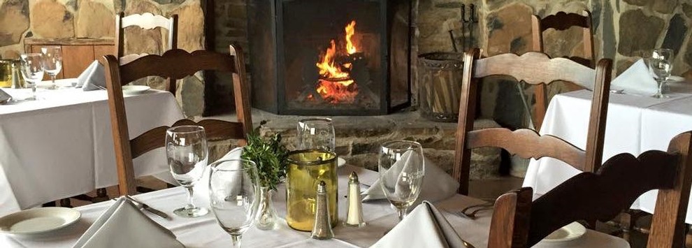 Chateau Morrisette fireplace dinner table